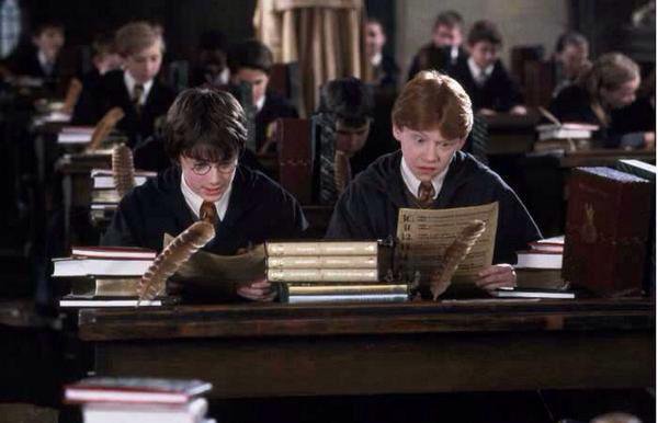 Harry and Ron taking a test.